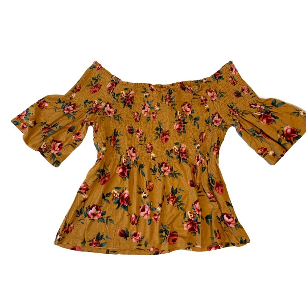 Ricki’s size Large top